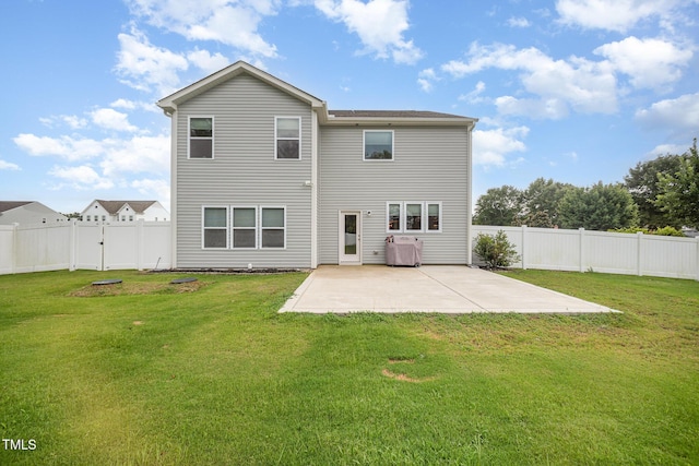 23 Walker Grove Ln, Lillington, NC 27546 - back of house featuring a patio area and a fenced backyard