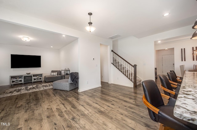 23 Walker Grove Ln, Lillington, NC 27546 - living area featuring wood finished floors, stairway, and recessed lighting