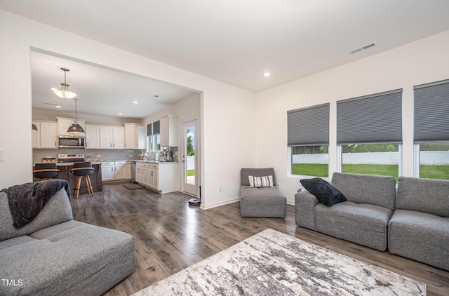 23 Walker Grove Ln, Lillington, NC 27546 - living area featuring dark wood finished floors and recessed lighting