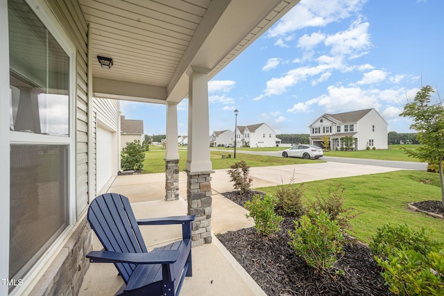 23 Walker Grove Ln, Lillington, NC 27546 - porch with a residential view and a lawn