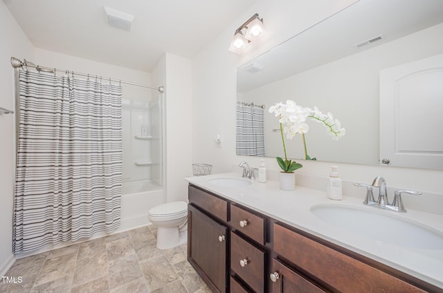 23 Walker Grove Ln, Lillington, NC 27546 - bathroom with double vanity, shower / bathtub combination with curtain, and stone finish floors