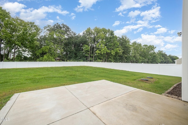 23 Walker Grove Ln, Lillington, NC 27546 - fenced backyard with a patio area