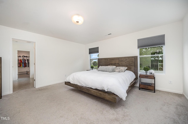 23 Walker Grove Ln, Lillington, NC 27546 - carpeted bedroom featuring baseboard heating and baseboards