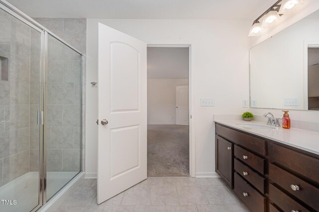 23 Walker Grove Ln, Lillington, NC 27546 - bathroom with vanity, a shower stall, and tile patterned flooring