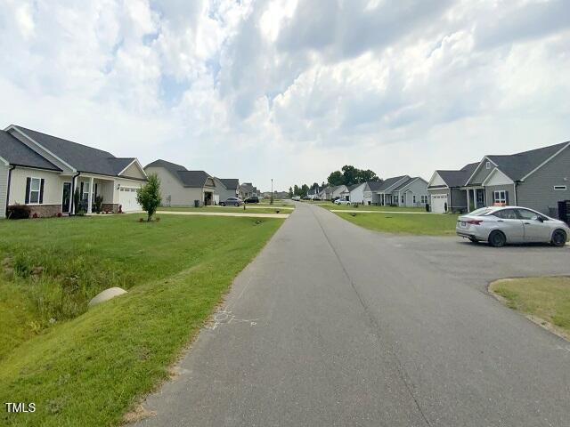 101 Mutton Dr, Pikeville, NC 27863 - view of asphalt street featuring a residential view