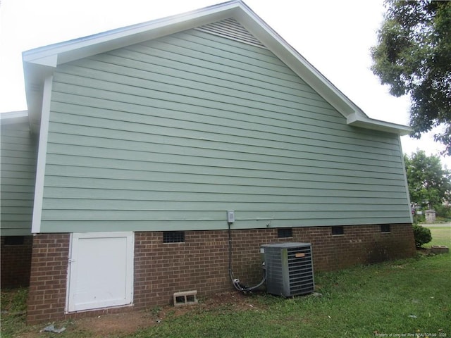 108 Shady Meadows Ln, Clayton, NC 27520 - view of side of home with crawl space and a lawn