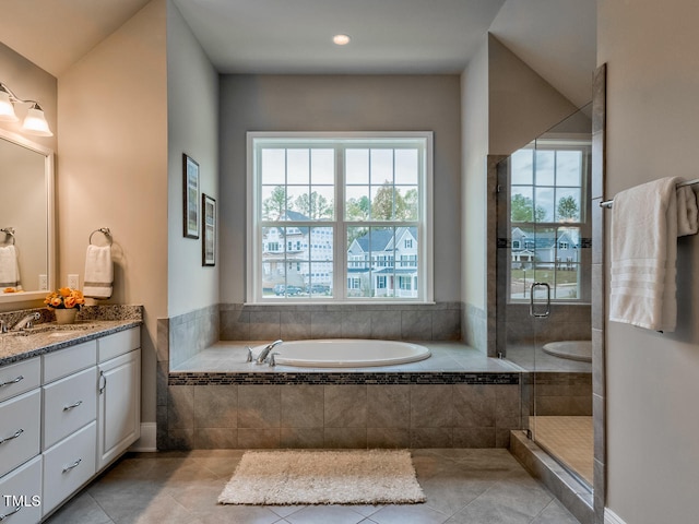 3526 Clifton Park Ct, New Hill, NC 27562 - bathroom featuring vanity, a bath, healthy amount of natural light, and a shower stall