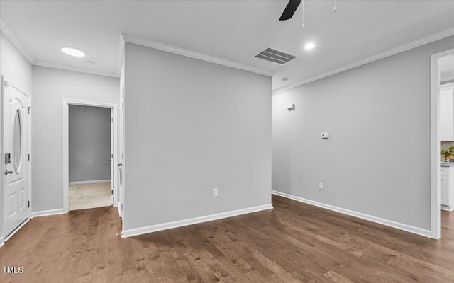 213 Guerrant St, Greensboro, NC 27401 - unfurnished room with a ceiling fan, wood finished floors, crown molding, and recessed lighting