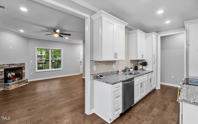 213 Guerrant St, Greensboro, NC 27401 - kitchen featuring dishwasher, ornamental molding, ceiling fan, white cabinets, and backsplash