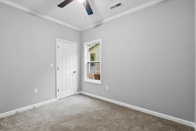 213 Guerrant St, Greensboro, NC 27401 - carpeted spare room featuring ceiling fan and crown molding