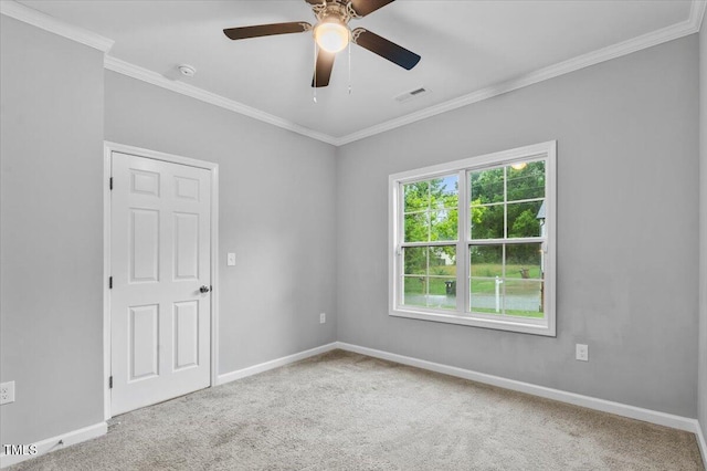 213 Guerrant St, Greensboro, NC 27401 - unfurnished room featuring carpet flooring, crown molding, and ceiling fan