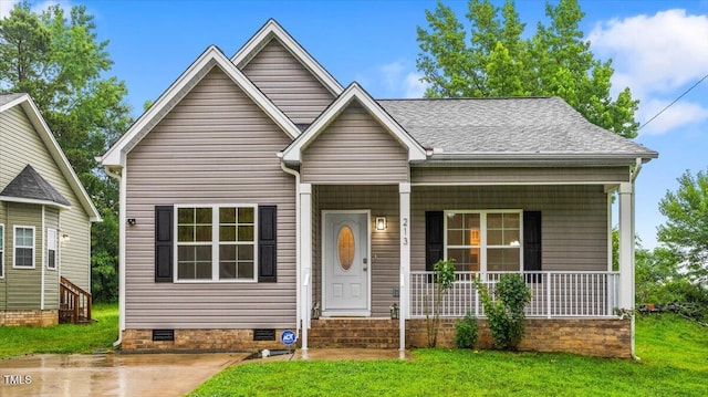 213 Guerrant St, Greensboro, NC 27401 - view of front of house featuring crawl space, covered porch, a front yard, and a shingled roof