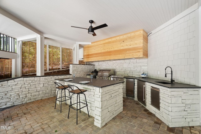 6701 Green Hollow Ct, Wake Forest, NC 27587 - kitchen with dark countertops, a ceiling fan, brick flooring, tasteful backsplash, and refrigerator
