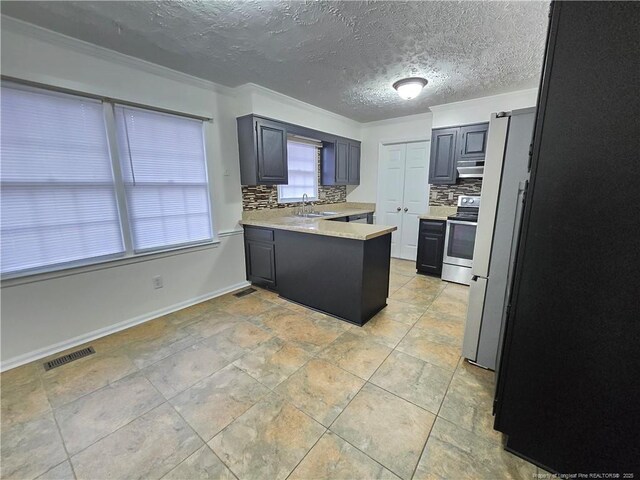1654 Baysden Ct, Fayetteville, NC 28303 - kitchen with stainless steel range with electric stovetop, a peninsula, backsplash, plenty of natural light, and crown molding