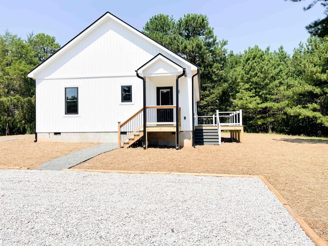 341 Rev Henderson Rd, Henderson, NC 27537 - view of front facade with crawl space and a wooden deck