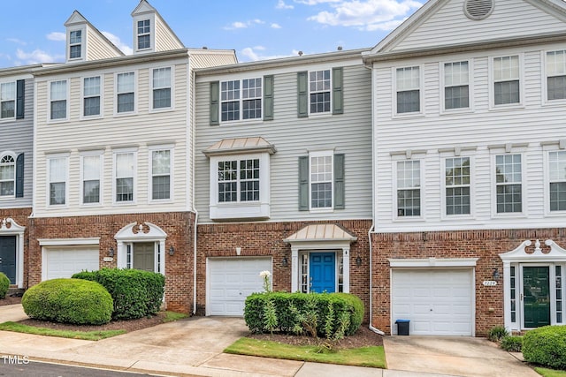 7226 Corvette Ct, Raleigh, NC 27613 - colonial inspired home featuring a garage, driveway, and brick siding