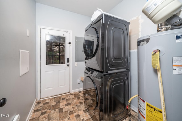 7226 Corvette Ct, Raleigh, NC 27613 - laundry room featuring water heater, stacked washer / drying machine, electric panel, and stone finish floors