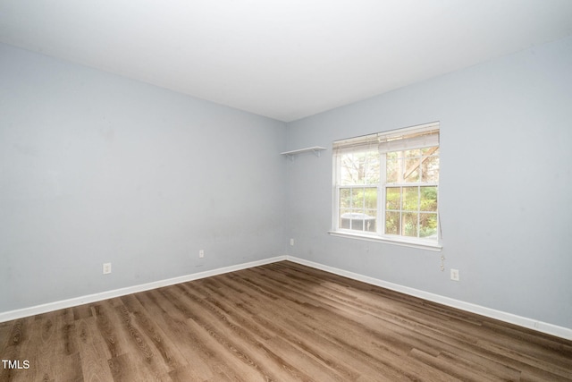7226 Corvette Ct, Raleigh, NC 27613 - spare room with wood finished floors and baseboards