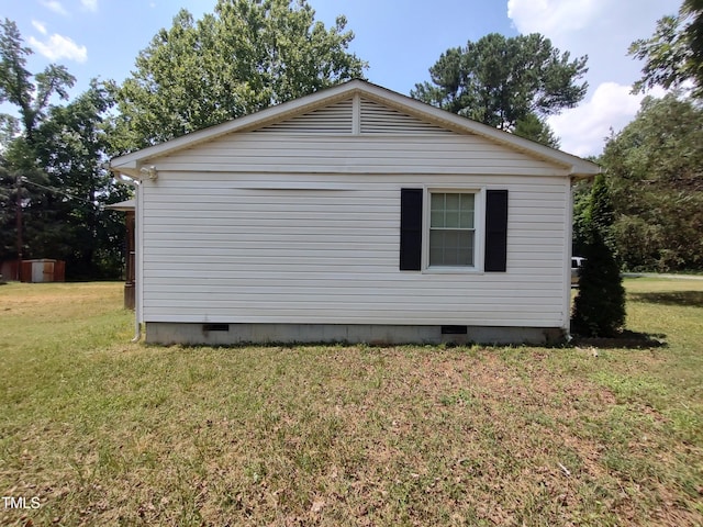 1161 Morgan Rd, Henderson, NC 27537 - view of side of home featuring crawl space and a yard