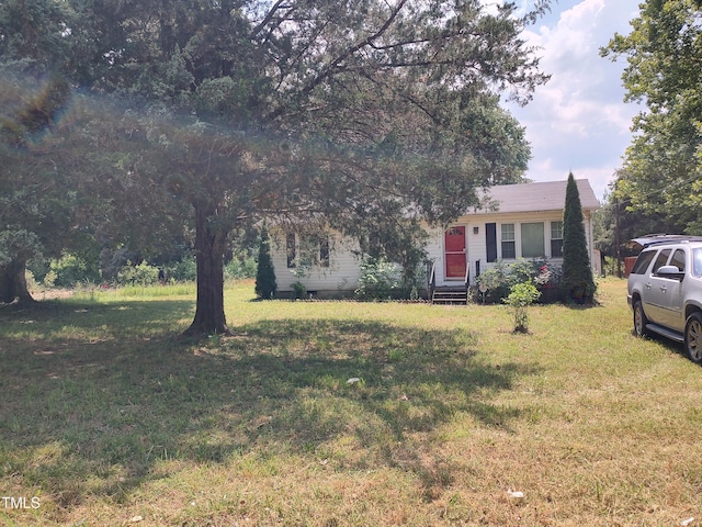 1161 Morgan Rd, Henderson, NC 27537 - view of property hidden behind natural elements featuring a front yard