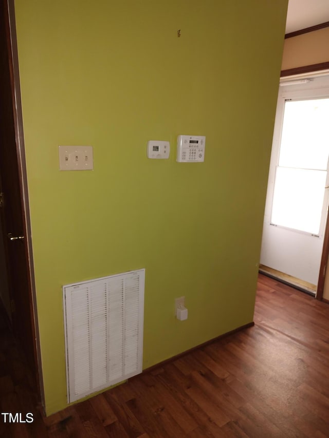1161 Morgan Rd, Henderson, NC 27537 - laundry area featuring dark wood-style flooring