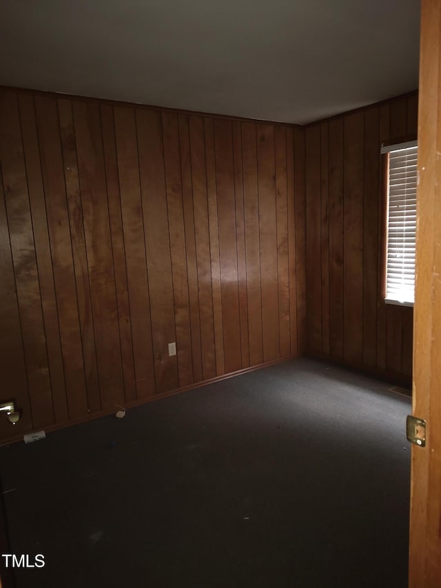 1161 Morgan Rd, Henderson, NC 27537 - carpeted spare room featuring wooden walls