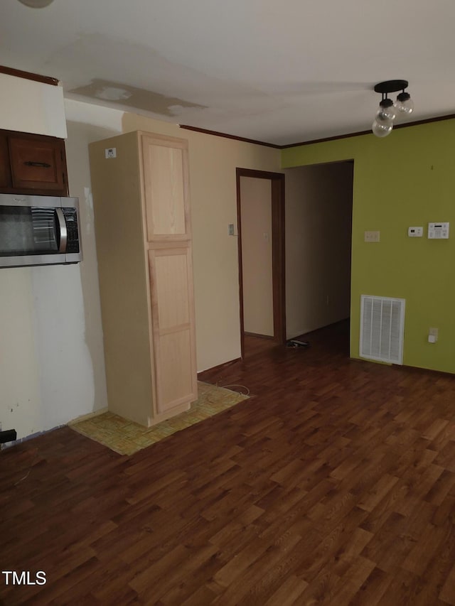 1161 Morgan Rd, Henderson, NC 27537 - spare room featuring dark wood finished floors