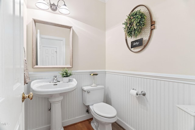 2608 Forestbluff Dr, Fuquay Varina, NC 27526 - bathroom with wood finished floors and toilet