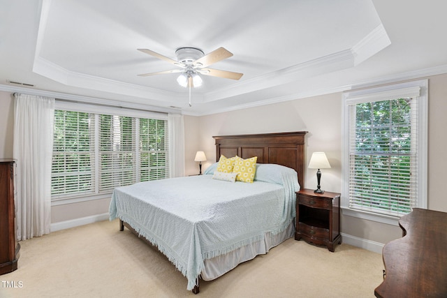 2608 Forestbluff Dr, Fuquay Varina, NC 27526 - bedroom with a raised ceiling, light carpet, crown molding, and a ceiling fan