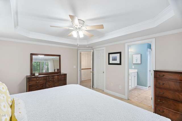2608 Forestbluff Dr, Fuquay Varina, NC 27526 - bedroom with a tray ceiling, crown molding, ensuite bathroom, a ceiling fan, and tile patterned floors