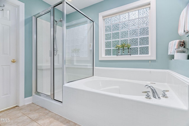 2608 Forestbluff Dr, Fuquay Varina, NC 27526 - bathroom with a shower stall, a garden tub, and tile patterned floors