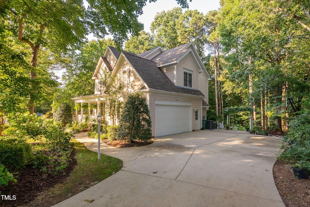 2608 Forestbluff Dr, Fuquay Varina, NC 27526 - view of property exterior featuring driveway and roof with shingles