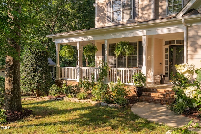 2608 Forestbluff Dr, Fuquay Varina, NC 27526 - doorway to property with a porch and a lawn