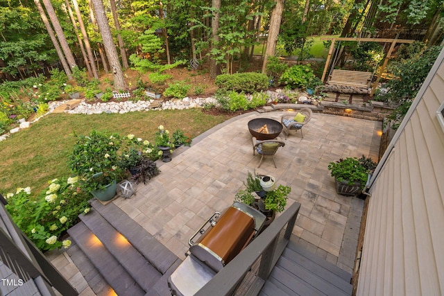 2608 Forestbluff Dr, Fuquay Varina, NC 27526 - view of patio / terrace with an outdoor fire pit