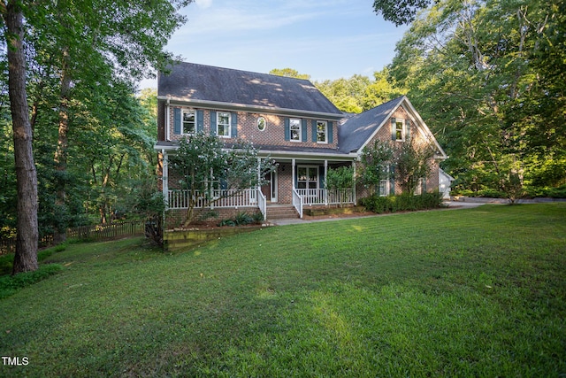900 Stonecutter Ct, Raleigh, NC 27614 - colonial inspired home with a porch and brick siding
