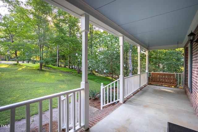 900 Stonecutter Ct, Raleigh, NC 27614 - covered porch featuring a yard