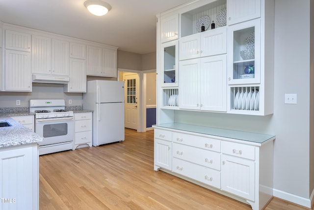 900 Stonecutter Ct, Raleigh, NC 27614 - kitchen featuring white appliances, under cabinet range hood, white cabinetry, light wood-type flooring, and light stone counters