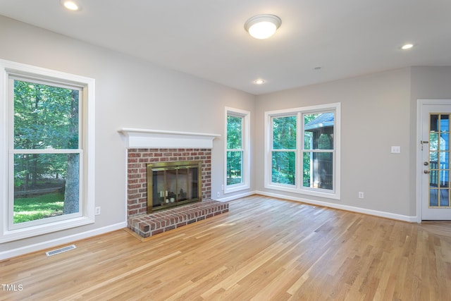 900 Stonecutter Ct, Raleigh, NC 27614 - unfurnished living room featuring wood finished floors, a fireplace, and recessed lighting