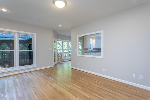 900 Stonecutter Ct, Raleigh, NC 27614 - unfurnished room with light wood-type flooring and recessed lighting