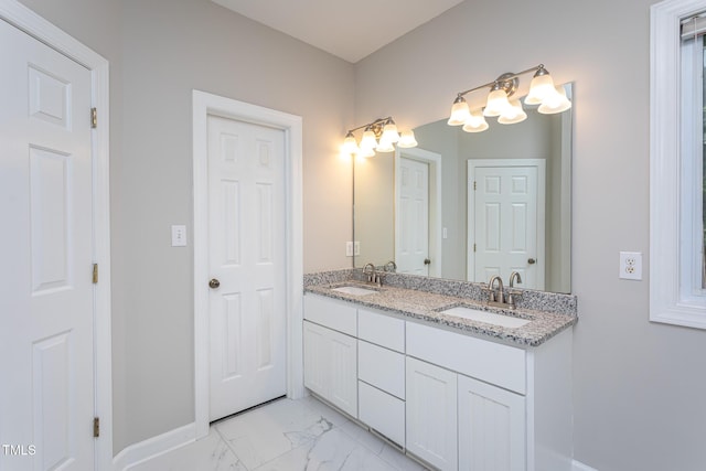 900 Stonecutter Ct, Raleigh, NC 27614 - bathroom with double vanity and marble finish floors