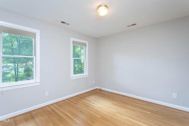 900 Stonecutter Ct, Raleigh, NC 27614 - empty room featuring plenty of natural light and light wood finished floors