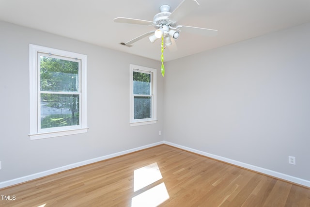 900 Stonecutter Ct, Raleigh, NC 27614 - unfurnished room with light wood finished floors, plenty of natural light, and a ceiling fan
