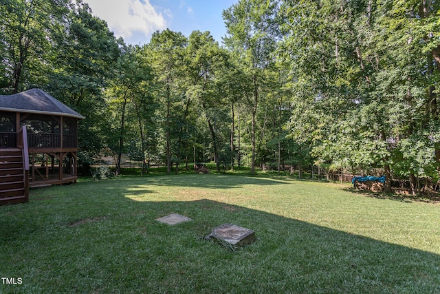 900 Stonecutter Ct, Raleigh, NC 27614 - view of green lawn featuring stairway and a deck