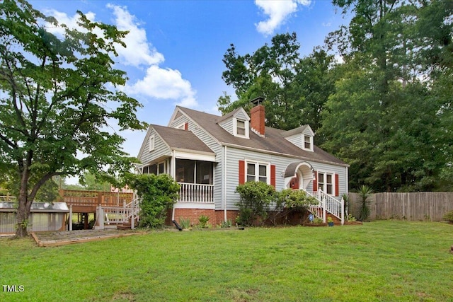 607 E Geer St, Durham, NC 27701 - view of front of property featuring a sunroom and a chimney