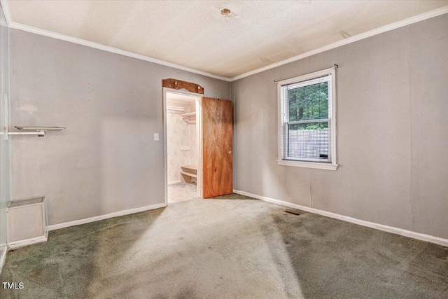 607 E Geer St, Durham, NC 27701 - carpeted spare room with ornamental molding and baseboards
