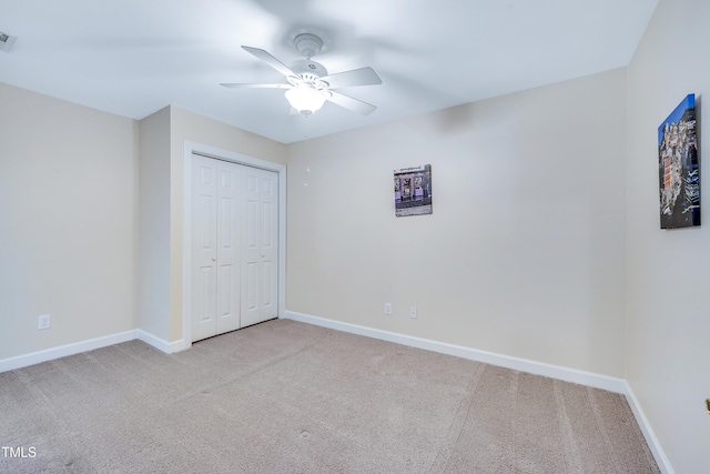 325 Millet Dr, Morrisville, NC 27560 - unfurnished bedroom featuring carpet flooring, a closet, and a ceiling fan