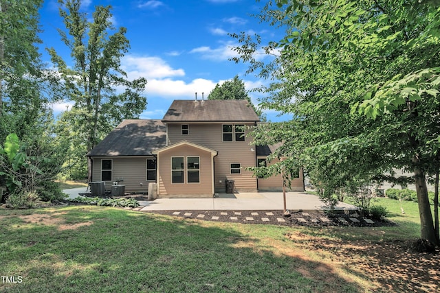 211 Camille Cir, Youngsville, NC 27596 - back of property with a yard, a patio, and roof with shingles