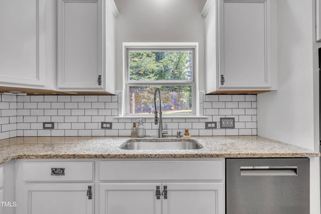 211 Camille Cir, Youngsville, NC 27596 - kitchen with dishwasher, white cabinets, backsplash, and light stone counters