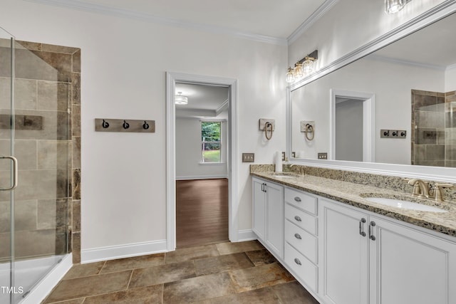 211 Camille Cir, Youngsville, NC 27596 - bathroom featuring double vanity, crown molding, and a stall shower