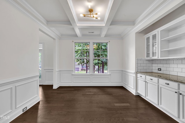 211 Camille Cir, Youngsville, NC 27596 - unfurnished dining area with healthy amount of natural light, a chandelier, beamed ceiling, wainscoting, and coffered ceiling